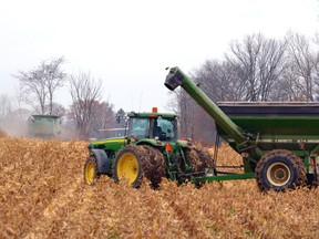 With what could be a record harvest season for corn yields nearly over, farmers rushed to get the last of their corn off the fields last week before the rain and foul weather November is best known for began. GALEN SIMMONS/MITCHELL ADVOCATE