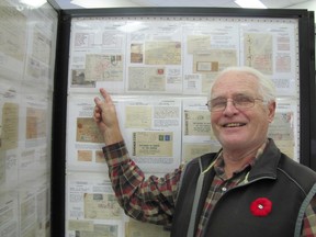 Mike Deery stands in front of one of the five panels he entered in the Kentpex stamp exhibition held in Chatham on Saturday, Nov. 7. In the photo, he points to an example of mail that was censored during the Second World War.