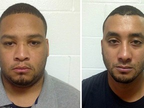 These booking photos provided by the Louisiana State Police show Marksville City Marshals Derrick Stafford (left) and Norris Greenhouse Jr. (Louisiana State Police via AP)