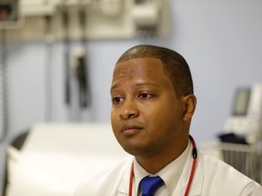 Dr. Raymond Givens speaks during an interview at Columbia University Medical Center in New York, Tuesday, Nov. 3, 2015. Givens was the leader of a new study that found that wealthy people are more likely to get themselves onto multiple transplant waiting lists and score a donated organ, and less likely to die while waiting for one to become available. (AP Photo/Seth Wenig)