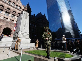 Sentries from the 48th Highlanders at the Remembrance Day ceremony at the cenotaph in front of Toronto's Old City Hall on Tuesday November 11, 2014. (Michael Peake/Toronto Sun)