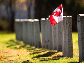 The Veterans section of Woodland cemetery was added in 1939 and features rows upon rows of military graves in London, Ont. on Sunday November 8, 2015. 
(Mike Hensen/The London Free Press/Postmedia Network)