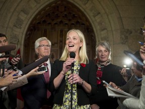 Minister of Environment and Climate Change Catherine McKenna speaks to reporters after her swearing-in, in Ottawa, on November 4, 2015. (THE CANADIAN PRESS/Justin Tang)