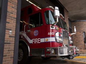 Firefighters back up a pumper truck during a City of Edmonton Fire Rescue Services open house at Millwoods Fire Station 16 at 2904 66 Street.