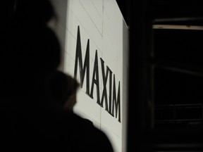 A New York lawyer went on trial Monday on charges he participated in a scheme involving the impersonation of a successful businessman that was aimed at fraudulently obtaining millions of dollars to buy Maxim magazine. (Sergi Alexander/AFP)