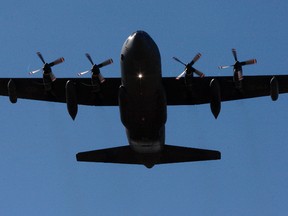 File photo of a Lockheed Martin CC-130 Hercules taking off on Monday August 24, 2015 from the Grande Prairie Airport in Grande Prairie, Alta. Tom Bateman/Postmedia Network/Files