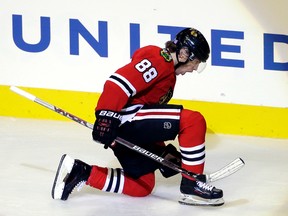 Chicago Blackhawks right winger Patrick Kane celebrates after scoring his goal during the third period against the Edmonton Oilers in Chicago on Nov. 8, 2015. (AP Photo/Nam Y. Huh)