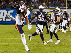 Chicago Bears tight end Zach Miller makes a touchdown catch during the second half of an NFL football game against the San Diego Chargers, Monday, Nov. 9, 2015, in San Diego. (AP Photo/Lenny Ignelzi)