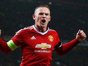 Manchester United’s Wayne Rooney celebrates scoring their first goal against CSKA Moscow in Champions League play at Old Trafford. (Reuters/Darren Staples)