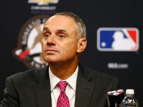Rob Manfred speaks to the media prior to Game 3 of the World Series between the New York Mets and the Kansas City Royals at Citi Field on October 30, 2015 in New York. (Mike Stobe/Getty Images/AFP)