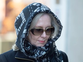 Diana Sedlacek, identified in court documents as the late Richard Oland's girlfriend, arrives to testify at Dennis Oland's murder trial in Saint John, N.B. on Tuesday, Nov. 10, 2015. Oland is charged with second degree murder in the death of his father, Richard, who was found dead in his Saint John office on July 7, 2011. (THE CANADIAN PRESS/Andrew Vaughan)