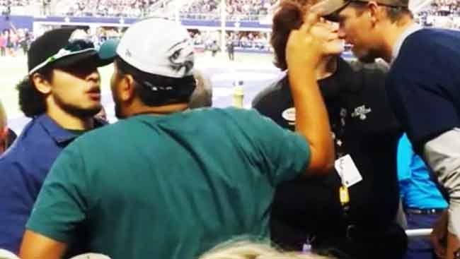 Red Sox fan spits on man over seat dispute