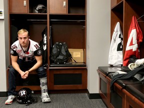 Ottawa RedBlacks punter Ronnie Pfeffer sits in his locker room in Ottawa Ontario Tuesday Nov 10, 2015. Ronnie's grandfather served in the Korean War and every Remembrance Day he writes a letter to him telling him how proud he is of his service.  Tony Caldwell/Ottawa Sun/Postmedia Network