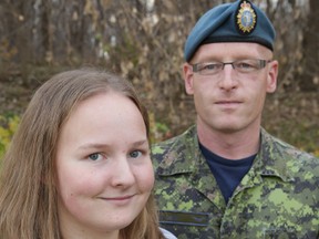 Callie Cullen, 16, pictured here with her father Kyril Cullen, will be the fourth generation of her family to go into the military. (Elliot Ferguson/The Whig-Standard)