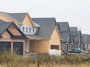 While local housing starts ? like this residence on Ballymote Avenue in northeast London ? have risen, numbers are down across Canada. (CRAIG GLOVER, The London Free Press)