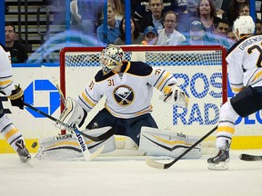 Sabres goalie Chad Johnson makes a save against the Lightning during first period NHL action in Tampa, Fla., on Tuesday, Nov. 10, 2015. Colin Campbell, the NHL’s director of hockey operations, says don't expect to see the league increase the size of nets as a way to boost goal scoring. (Kim Klement/USA TODAY Sports)