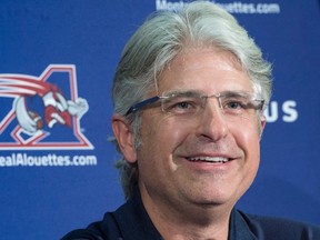 Montreal Alouettes Jim Popp smiles after being confirmed as head coach for the next season during a news conference in Montreal on Nov. 9, 2015. (THE CANADIAN PRESS/Paul Chiasson)