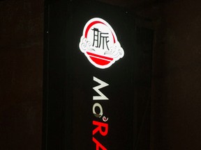 A close up shot of a one of the signs of Korean restaurant in downtown Toronto Tuesday November 10, 2015.  McRamyum's was forced to change its name to Mo'Ramyun by McDonald's. (Ernest Doroszuk/Toronto Sun)