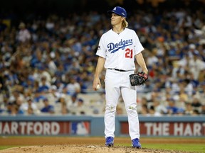 Zack Greinke of the Los Angeles Dodgers reacts in the seventh inning against the New York Mets in Game 5 of the National League Division Series at Dodger Stadium in Los Angeles on Oct. 15, 2015. (Sean M. Haffey/Getty Images/AFP)