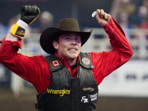 Scott Schiffner wins the bullriding event during the final day of Canadian Finals Rodeo (CFR) at Rexall Place in Edmonton on Sunday, November 11, 2012. CODIE MCLACHLAN/EDMONTON SUN QMI AGENCY