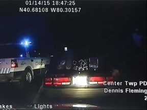 The screengrab of a dashcam video shows a handcuffed woman, Roxanne Rimer, lead officers on chase in stolen cruiser in Pennsylvania in January.