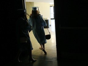 Members of the Barnard College Class of 2015 prepare to join the procession of graduates at the 123rd Commencement of Barnard College at The Theater at Madison Square Garden on May 17, 2015 in New York City.  Jemal Countess/Getty Images/AFP