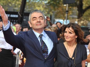 Rowan Atkinson with then-wife Sunetra. (WENN.COM)