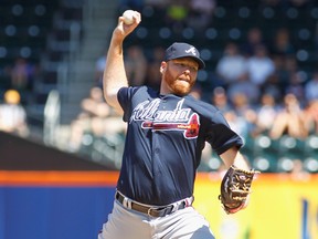 Tommy Hanson #48 of the Atlanta Braves pitches against the New York Mets at Citi Field on September 9, 2012 in the Flushing neighborhood of the Queens borough of New York City.   Andy Marlin/Getty Images/AFP