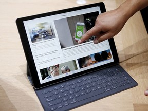 The new Apple iPad Pro and keyboard are displayed during an Apple media event in San Francisco, Sept. 9, 2015. REUTERS/Beck Diefenbach