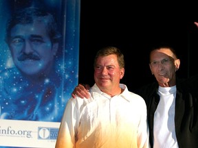 William Shatner, left, who played Captain Kirk, and Leonard Nimoy, who played Spock in the original Star Trek series, wave on stage at a Star Trek convention in Hollywood in 2004. The sci-fi show Star Trek is returning to television, with a new series introducing new characters and alien civilizations that will launch in January 2017, CBS Television said on Nov. 2. (Gene Blevins/Reuters)