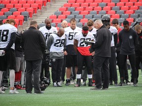 Team chaplain Paul Huggins spoke to the Ottawa RedBlacks about the importance of Remembrance Day, closing the discussion with a prayer on Wednesday at TD Place. (TIM BAINES/OTTAWA SUN)