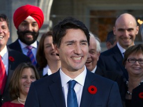 Prime Minister Justin Trudeau holds a news conference with his cabinet after they were sworn-in at Rideau Hall in Ottawa, Wednesday, November 4, 2015. Trudeau's succinct "because it's 2015" explanation of his new, half-female cabinet has attracted international attention. THE CANADIAN PRESS/Fred Chartrand