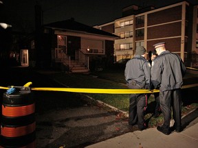 Police cordon off an area near Bircmount Rd. and St. Clair Ave. E. on Nov. 11, 2015 for a suspicious death investigation. (John Hanley/Special to the Toronto Sun)