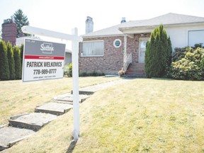 In a red-hot housing market like Vancouver?s, this modest home listed in 2013 for $2 million. The federal Liberals have pledged to review home prices in high-priced markets. (Postmedia Network file photo)