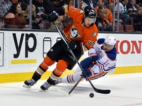 Oilers forward Nail yhakupov goes down while chasing Ducks defenceman HampusLindholm in Anaheim Wednesday. (USA TODAY SPORTS)