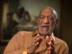 In this Nov. 6, 2014, file photo, entertainer Bill Cosby gestures during an interview at the Smithsonian's National Museum of African Art in Washington. Kristina Ruehli on Monday, Nov. 9, 2015, filed a federal lawsuit saying Cosby falsely accused her of lying when she came forward last year and said he raped her in 1965. (AP Photo/Evan Vucci, File)