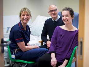 Pauline Cafferkey (R) smiles alongside Doctor Michael Jacobs and Senior Matron Breda Athan at the Royal Free Hospital in London, November 11, 2015. The Scottish nurse who contracted and initially recovered from Ebola, but then suffered a relapsing illness, has now recovered from meningitis caused by the Ebola virus persisting in her brain.  REUTERS/Royal Free Hospital/Handout