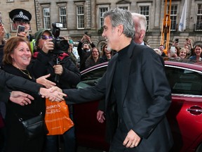 George Clooney visits Social Bite, the Post Code Lottery offices and Tiger Lily restaurant in Edinburgh. (WENN.COM)