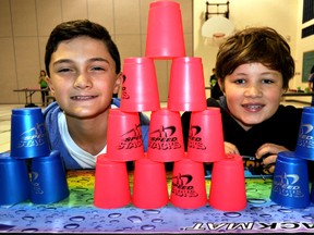Clara Brenton public school students Ethan Mazak (left) and Andy Brooks next to their stacking cups November 6, 2015. Over 300 students at the west London school will be part of a world record stacking attempt November 12. CHRIS MONTANINI\LONDONER\POSTMEDIA NETWORK
