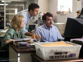 This photo provided by courtesy of Open Road Films shows, Rachel McAdams, from left, as Sacha Pfeiffer, Mark Ruffalo as Michael Rezendes and Brian d’Arcy James as Matt Carroll, in a scene from the film, "Spotlight." (Kerry Hayes/Open Road Films)