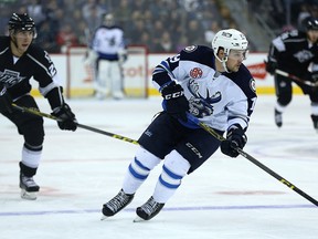 Manitoba Moose centre Chase De Leo carries the puck into the Ontario Reign zone during AHL action at MTS Centre last month. The Moose host the Chicago Wolves on Thursday and Friday night. (Kevin King/Winnipeg Sun file photo)