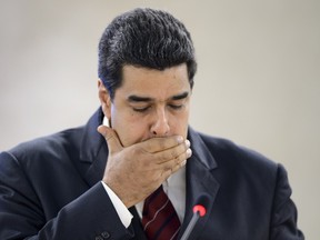 Venezuela's President Nicolas Maduro reacts as he addresses the UN human rights council on November 12, 2015 in Geneva. Maduro lashed out at those making "reckless accusations" against his country in an address at the UN Human Rights Council, a speech the US called "an affront" to the body.  (AFP/FABRICE COFFRINI)