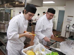 Students in Lambton College's culinary management program practice in the kitchen at the college's restaurant, Creations, in Sarnia, Ont. (Observer file photo)