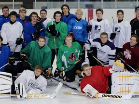 The Lambton Jr. Sting minor midget hockey team pauses for a moment at its Wednesday night practice at the Sarnia Sports and Entertainment Centre. The club was preparing for the Battle of the Border, a 12-team showcase tournament being held at the SSEC this weekend. (Terry Bridge, The Observer)