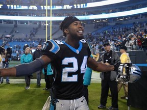 Panthers cornerback Josh Norman was fined $5,000 by the NFL for wearing cleats with "proud, brave" printed on them against the Packers last Sunday. (Streeter Lecka/Getty Images/AFP)