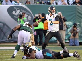 Jacksonville Jaguars quarterback Blake Bortles attempts a pass during the second half of the NFL game against the New York Jets at MetLife Stadium on Nov. 8, 2015. (Vincent Carchietta/USA TODAY Sports)