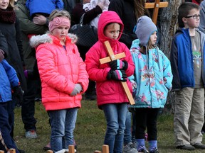 Young and old gathered in Rundle Park in Edmonton, for a Remembrance Day service. (TOM BRAID/Edmonton Sun)