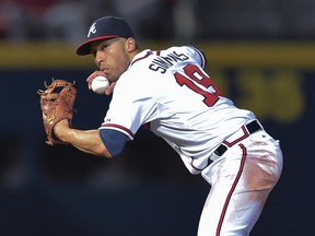 In this Sept. 30, 2015, file photo, Atlanta Braves shortstop Andrelton Simmons throws to first base for an out on Washington Nationals’ Wilson Ramos in Atlanta. (AP Photo/Jon Barash, File)