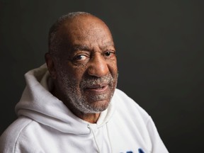 In this Nov. 18, 2013 file photo, actor-comedian Bill Cosby poses for a portrait in New York. The 2nd District Court of Appeal in Los Angeles on Thursday, Nov. 12, 2015, temporarily halted a lower court's order compelling Cosby and his former attorney to give sworn testimony to lawyers for model Janice Dickinson, who is suing the comedian for defamation over his denials of her allegations that he drugged and raped her in 1982. (Photo by Victoria Will/Invision/AP, File)