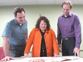 Pictured going over recently developed strategies are, from left, Canadian Mental Health Association Oxford Executive Director Mike McMahon; United Way Oxford Executive Director Kelly Gilson and Indwell Executive Director Jeffrey Neven. (Geoff Dale photo)